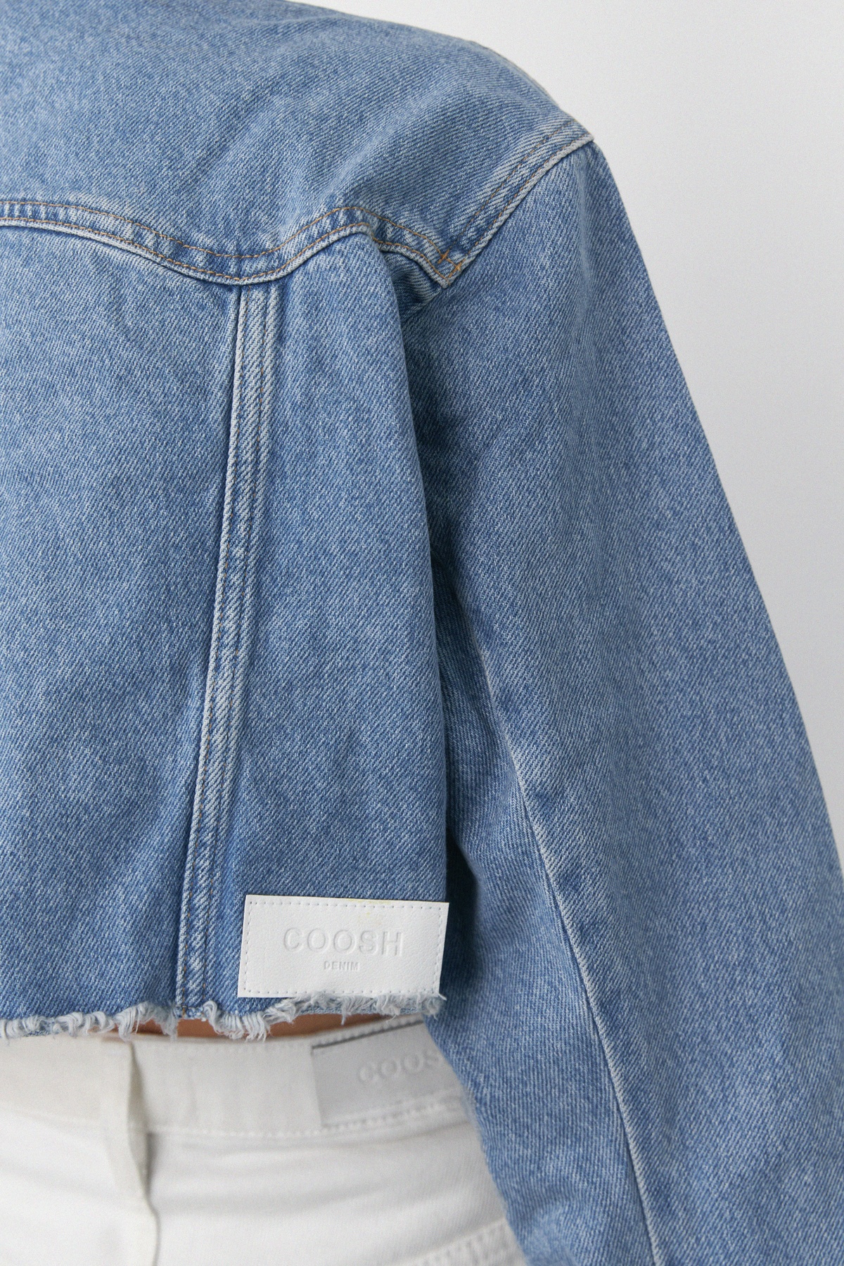 Cropped Denim Jacket with Unfinished Hem