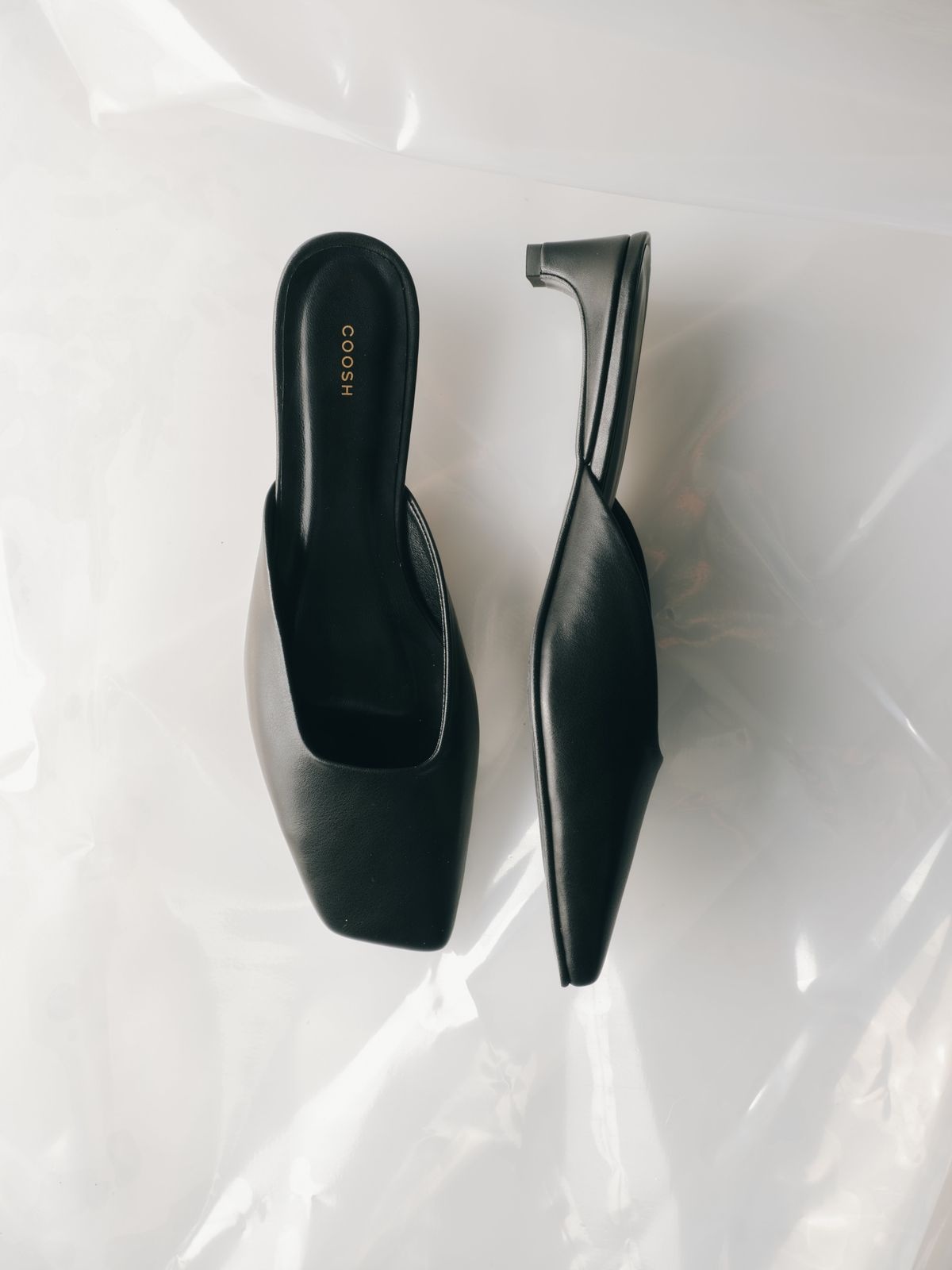 AMÉ Leather Mules with Asymmetric Toe