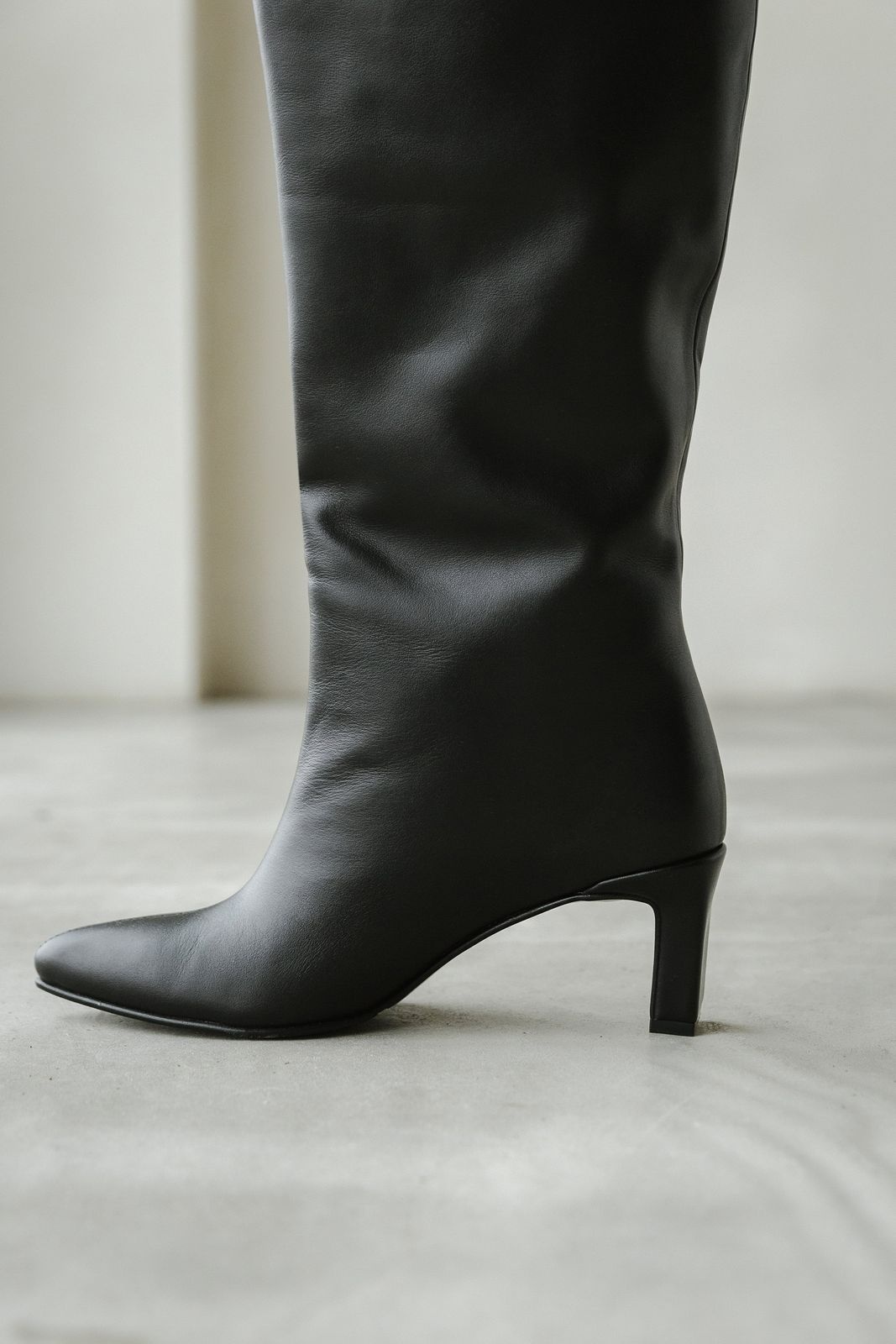 Knee High Heeled Leather Boots